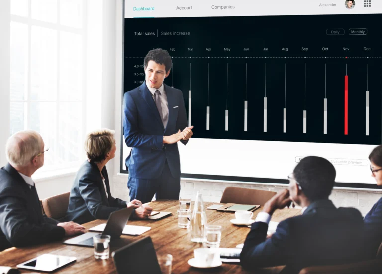 founder presenting a professionally designed pitch deck built by a PowerPoint designer to investors